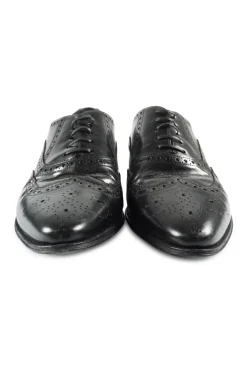Black polished leather pointed-toe Jacno oxfords with broguing details
