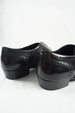Black polished leather pointed-toe Jacno oxfords with broguing details