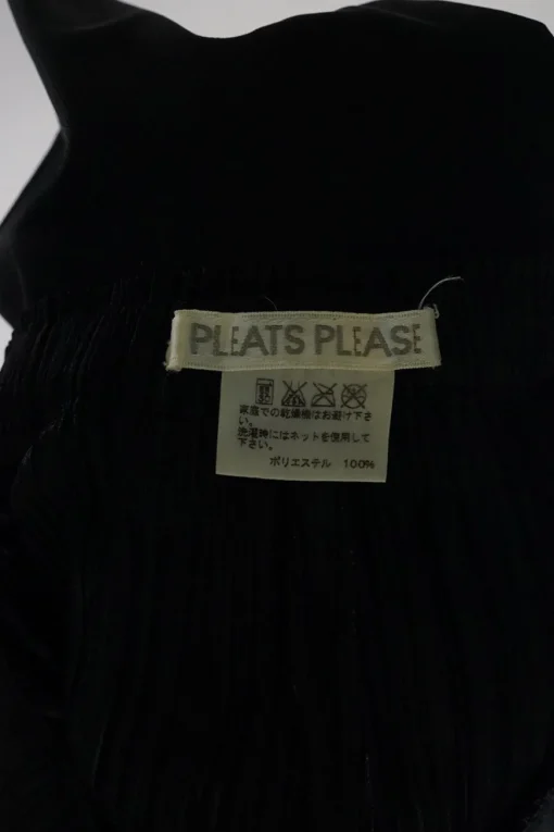 Black polyester pull-on high-rise flared plissé shorts with elasticated waist