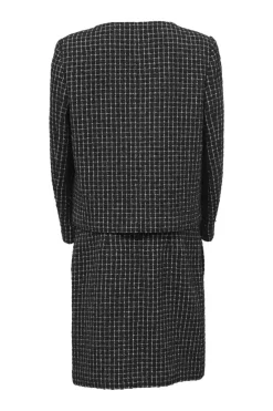 Black polyester-blend collarless tailored jacket and knee-length pencil skirt suit set