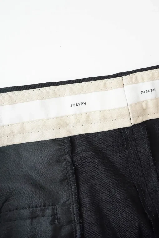Black polyester-blend crêpe low-rise tapered leg tailored trousers