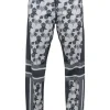 Black polyester-blend patchwork star print pull-on skinny pants
