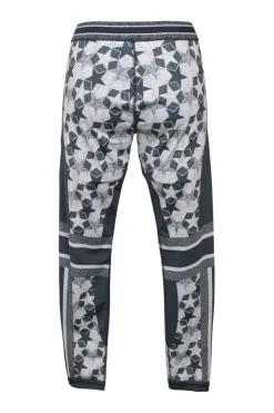 Black polyester-blend patchwork star print pull-on skinny pants
