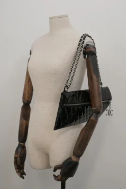 Black quilted patent leather Kaleidoscope chain shoulder bag with enamel Coco Mark zip stopper charm