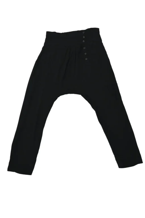 Black rayon pull-on drop-crotch pants with elasticated waistband and side button fly
