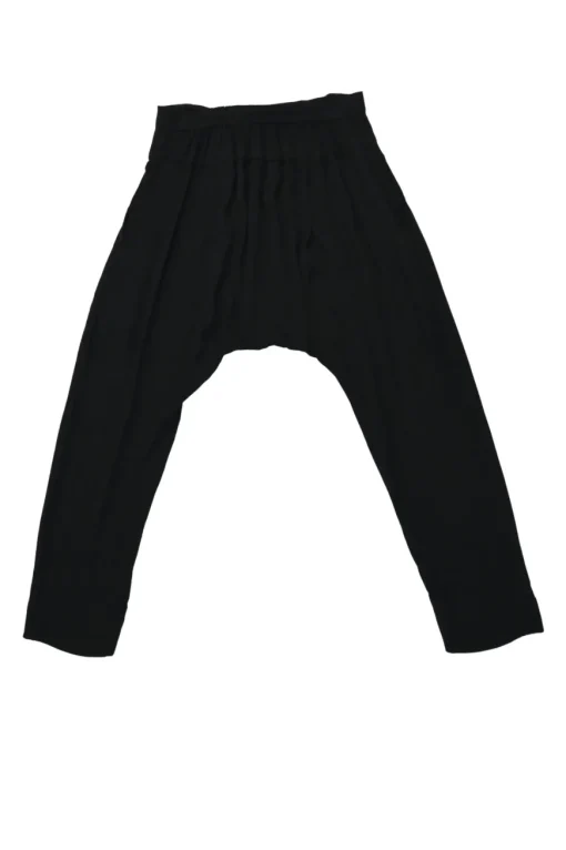 Black rayon pull-on drop-crotch pants with elasticated waistband and side button fly