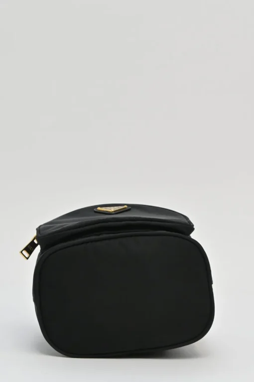 Black re-nylon duet drawstring bucket bag with front zip pocket in gold-tone metallic hardware