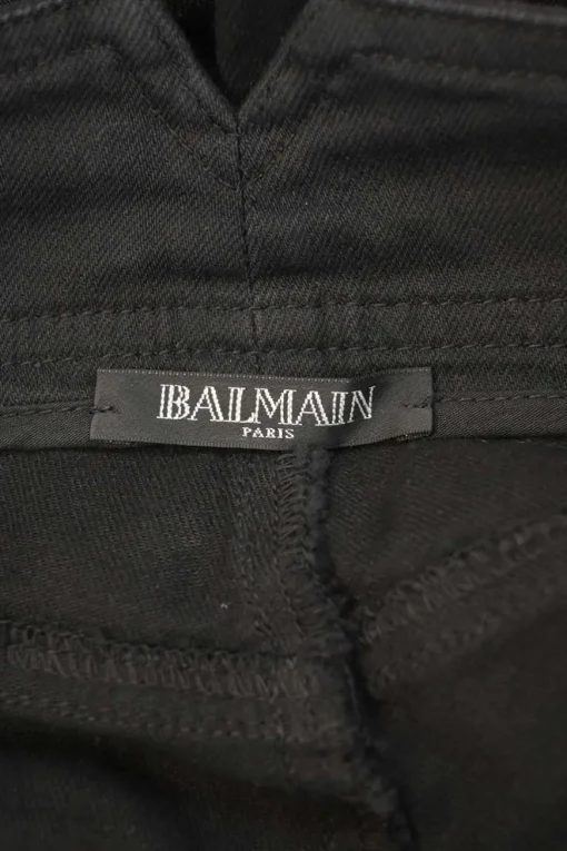 Black sailor-style skinny bootcut jeans featuring split waistband