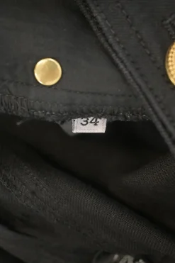 Black sailor-style skinny bootcut jeans featuring split waistband
