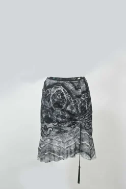 Black semi-sheer abstract print ruched nylon tassel mini skirt with flounce hem
