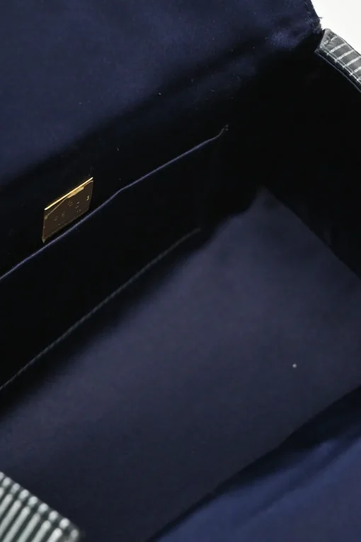 Black, silver, and gold leather shoulder bag with Zucca buckle magnetic snap closure