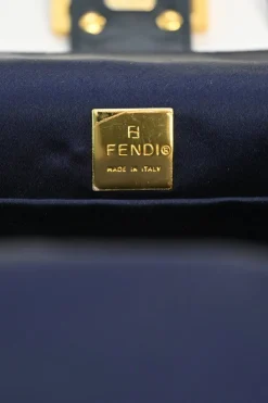 Black, silver, and gold leather shoulder bag with Zucca buckle magnetic snap closure
