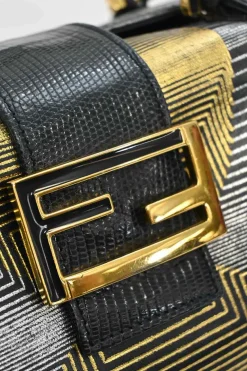 Black, silver, and gold leather shoulder bag with Zucca buckle magnetic snap closure