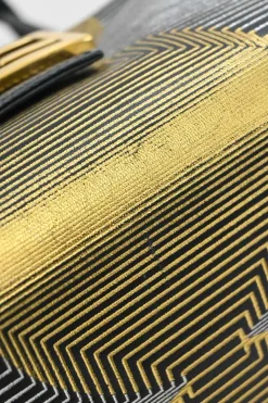 Black, silver, and gold leather shoulder bag with Zucca buckle magnetic snap closure