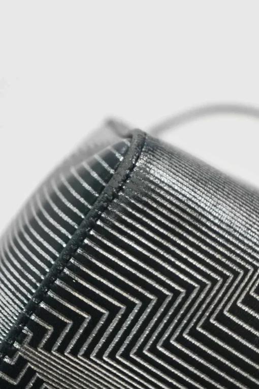 Black, silver, and gold leather shoulder bag with Zucca buckle magnetic snap closure