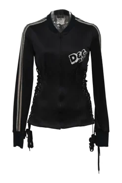 Black stretch-nylon corset style two-piece tracksuit featuring full-zip jacket and high-waist pants with side stripe and lace-up detailing