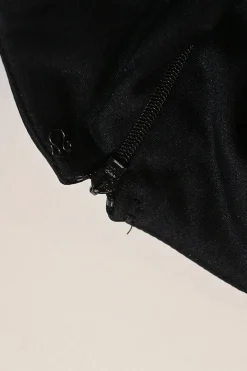 Black stretch-nylon corset style two-piece tracksuit featuring full-zip jacket and high-waist pants with side stripe and lace-up detailing