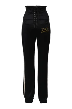 Black stretch-nylon corset style two-piece tracksuit featuring full-zip jacket and high-waist pants with side stripe and lace-up detailing