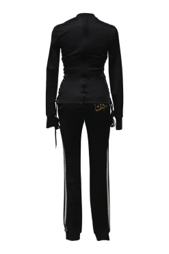 Black stretch-nylon corset style two-piece tracksuit featuring full-zip jacket and high-waist pants with side stripe and lace-up detailing