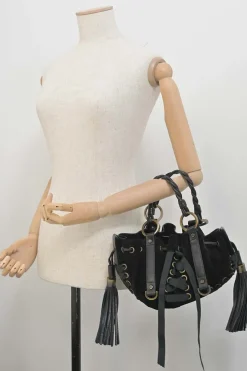 Black suede and leather Pumpkin tassel shoulder bag with braided handles and lace-up detailing at front