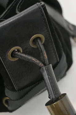 Black suede and leather Pumpkin tassel shoulder bag with braided handles and lace-up detailing at front