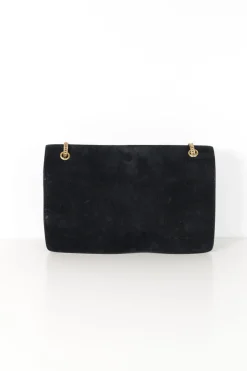 Black suede shoulder bag with gold tone chain and stitched corner fold up front detail