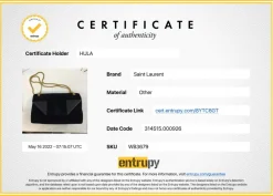 Black suede shoulder bag with gold tone chain and stitched corner fold up front detail