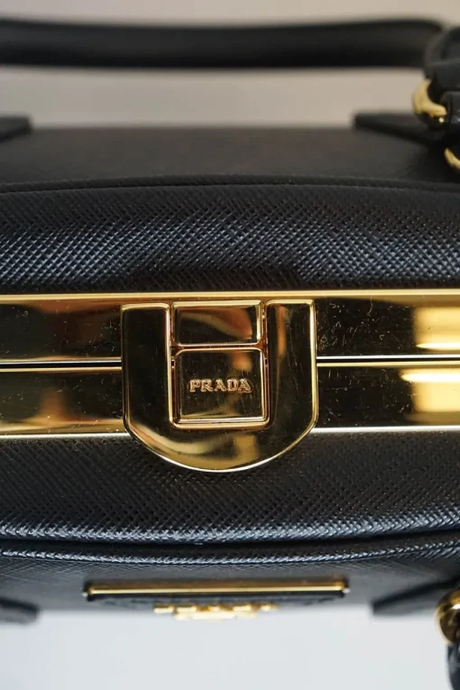 Black 'Vernice Pyramid' Saffiano leather small bag