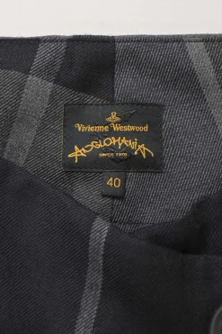 Black virgin wool check tweed wrap-front drop-crotch tapered leg tailored trousers