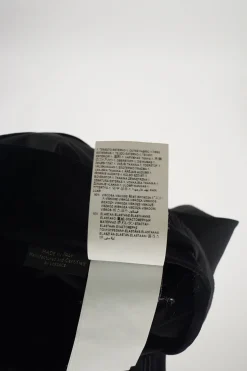 Black viscose-blend grommet biker leggings with exposed zip appliqué