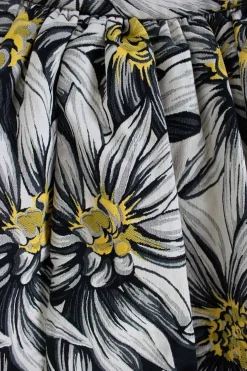 Black, white and yellow floral print mini skirt