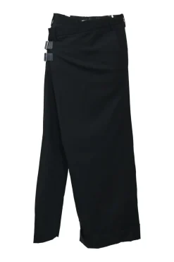 Black wool asymmetrical pants with wrap-front apron-style overlay
