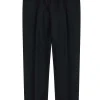 Black wool high waisted casual pants with folded hem and gold buckles.