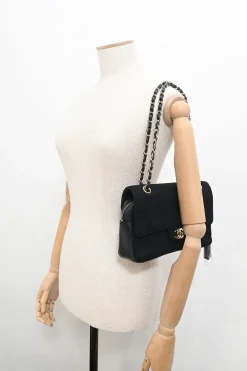 Black wool jersey mixed-media Chocolate Bar flap bag featuring calfskin leather gussets and gold-plated hardware