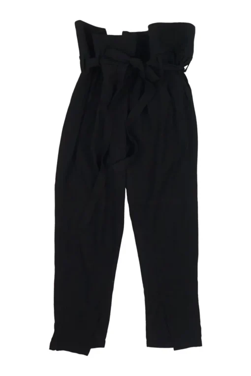 Black wool paperbag waist pull-on high-rise pleated tie-waist trousers with vented cuffs
