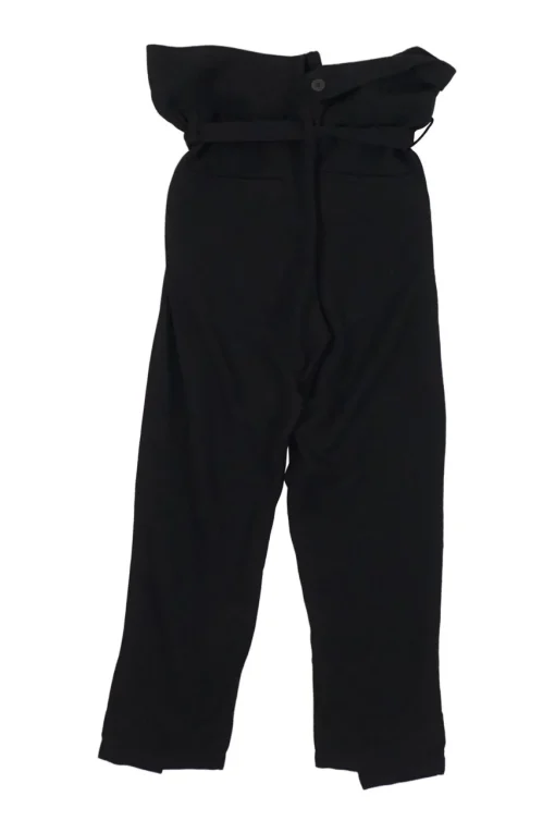 Black wool paperbag waist pull-on high-rise pleated tie-waist trousers with vented cuffs