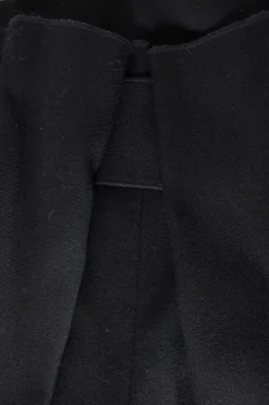 Black wool twill high-rise wide leg straight pants with wide waist band and pleats at front