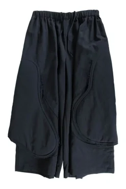 Black wool wide leg culottes in wool with  padded side panel cut outs. Elasticated waist with drawstring