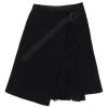 Black wool-blend boiled wool apron-style wrap-front skirt with semi-sheer raw edge plissé insert