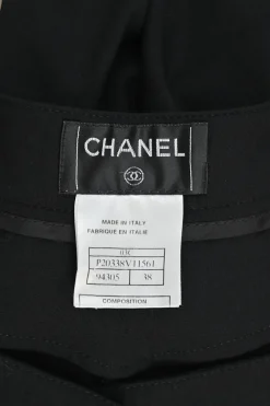 Black wool-blend pleated straight-leg trousers