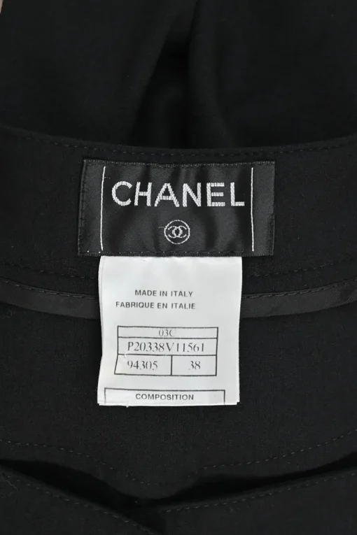 Black wool-blend pleated straight-leg trousers