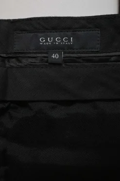 Black wool-blend striped jacquard low-rise flared tailored trousers with extended tab closure
