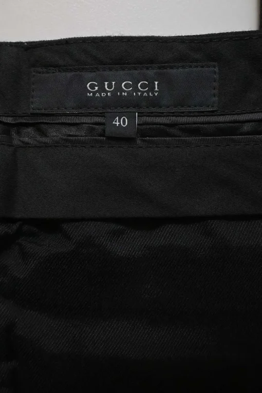 Black wool-blend striped jacquard low-rise flared tailored trousers with extended tab closure