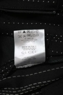 Black wool-blend striped jacquard low-rise flared tailored trousers with extended tab closure