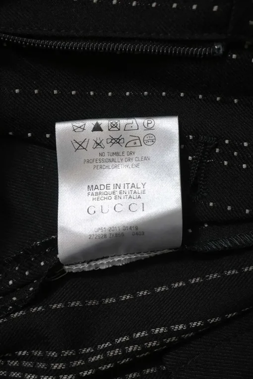 Black wool-blend striped jacquard low-rise flared tailored trousers with extended tab closure