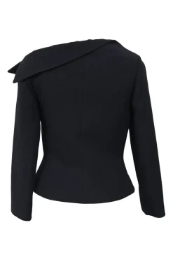 Black wool-silk blend two-piece skirt suit featuring asymmetric spread collar tailored jacket and drop-waist flounce mini skirt