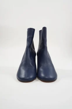 Blue calfskin pull-on round-toe zip-up ankle boots with cylindrical block heel and signature bar tack