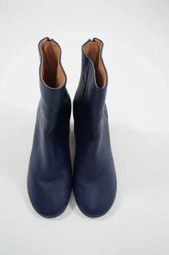 Blue calfskin pull-on round-toe zip-up ankle boots with cylindrical block heel and signature bar tack