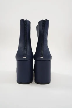 Blue calfskin pull-on round-toe zip-up ankle boots with cylindrical block heel and signature bar tack