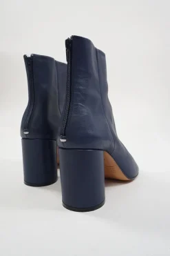 Blue calfskin pull-on round-toe zip-up ankle boots with cylindrical block heel and signature bar tack